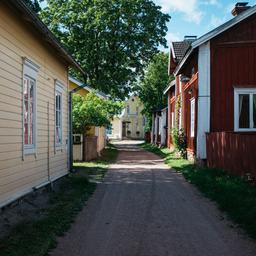 A narrow street in Pargas' Old Town, lined with wooden houses.